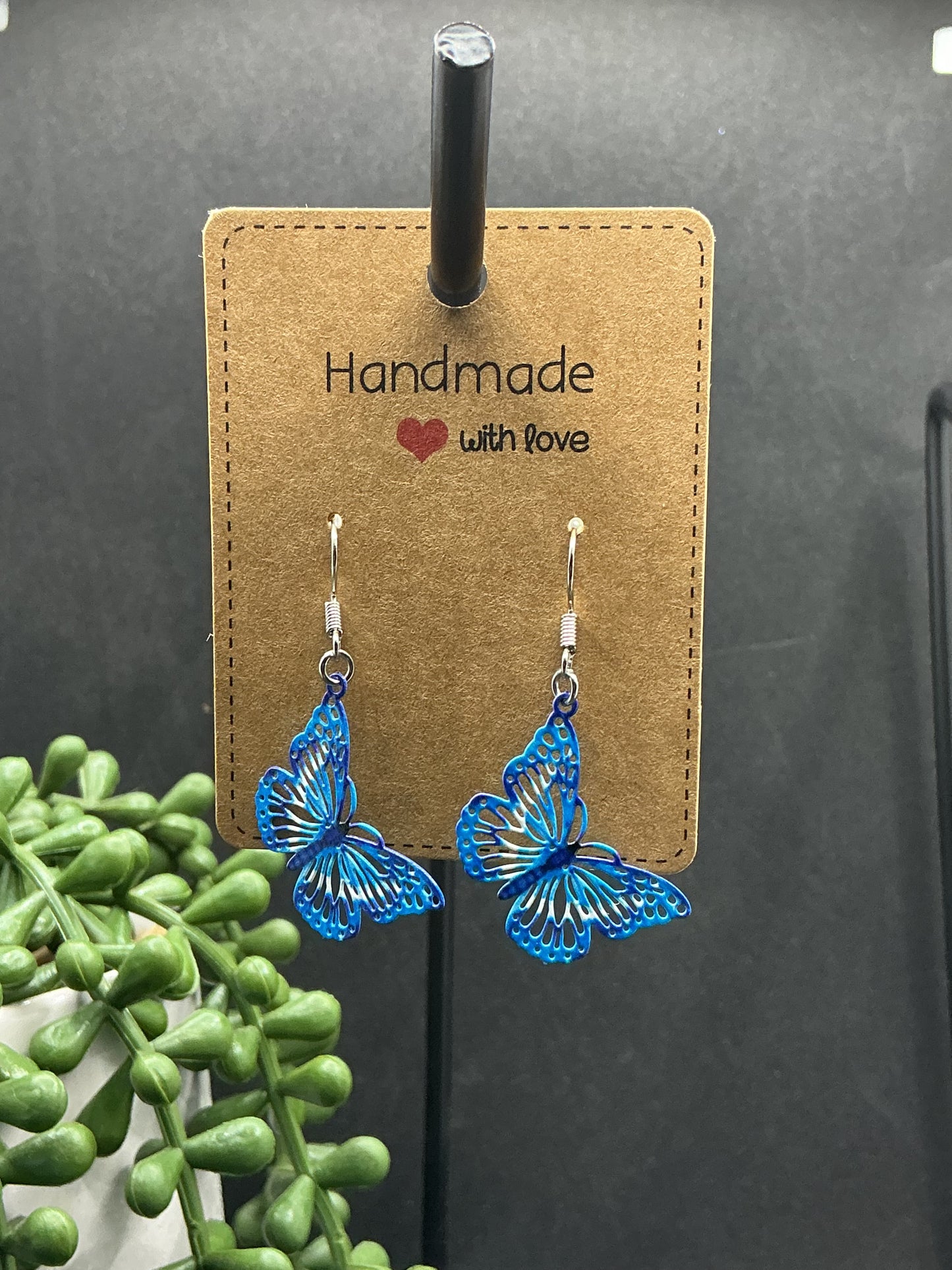 Small metal colour butterfly earrings